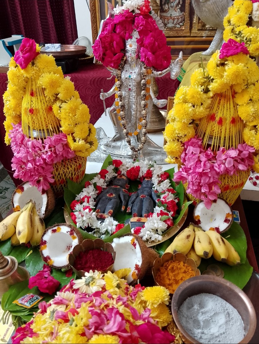Flowers, fruit and traditional offerings arranged for a private ceremony
